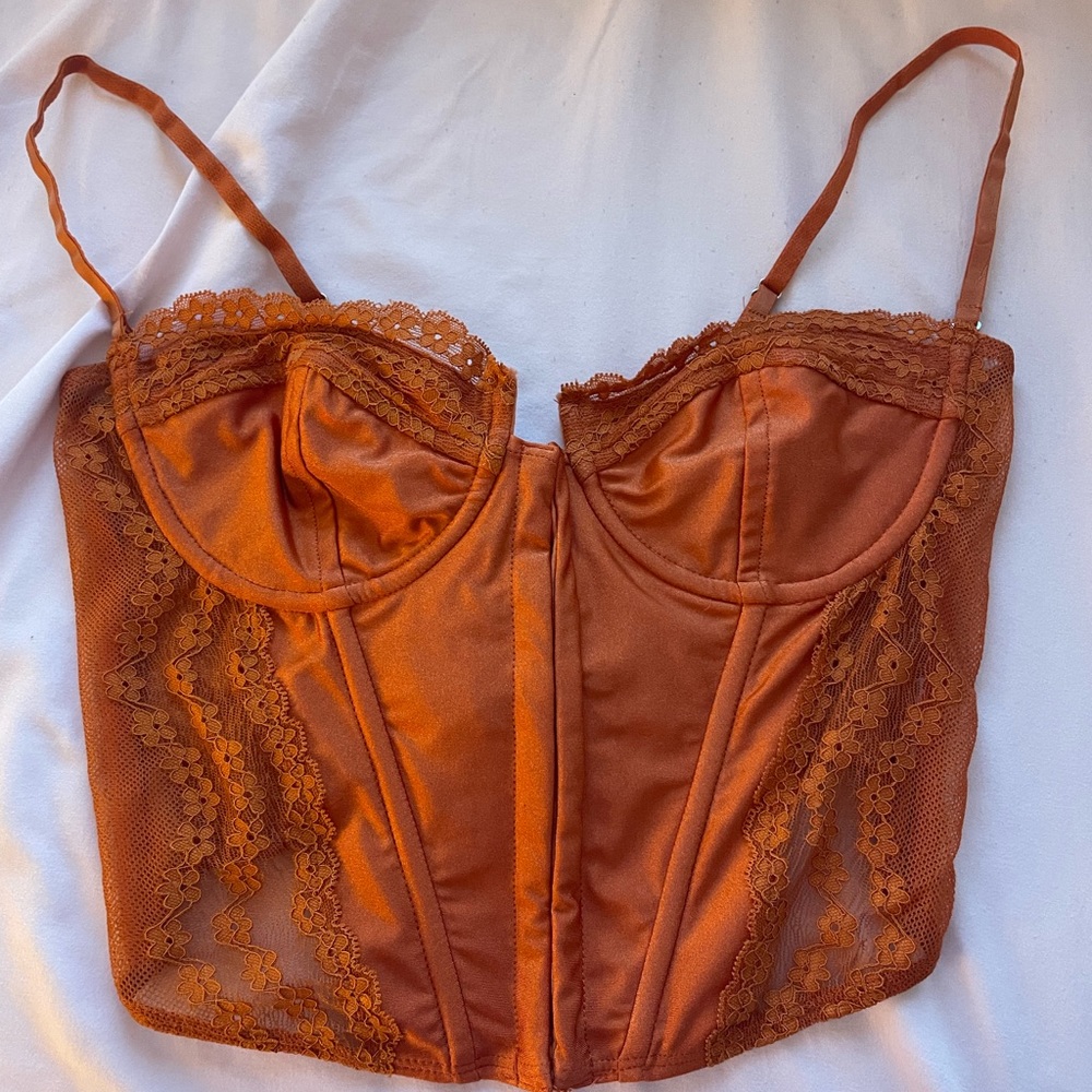 burnt orange corset top from edikted medium. adjustable ties. lace up top.